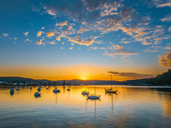 Sunrise views over the channel and bay with boats