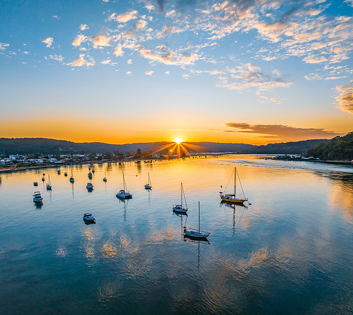 Sunrise views over the channel and bay with boats