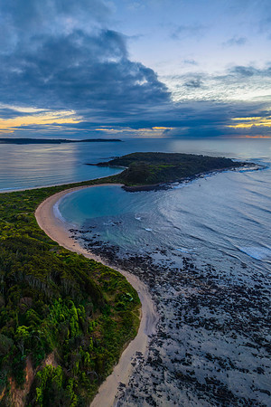 Sunrise with clouds and rocks