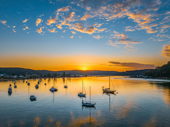 Sunrise views over the channel and bay with boats