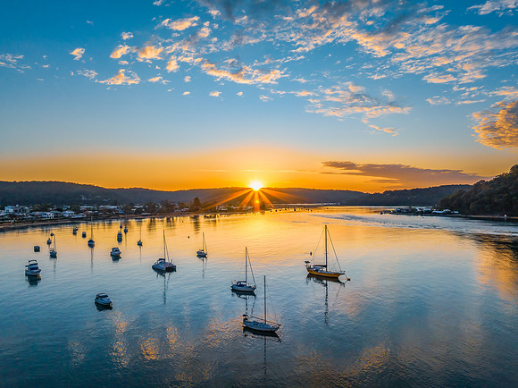 Sunrise views over the channel and bay with boats
