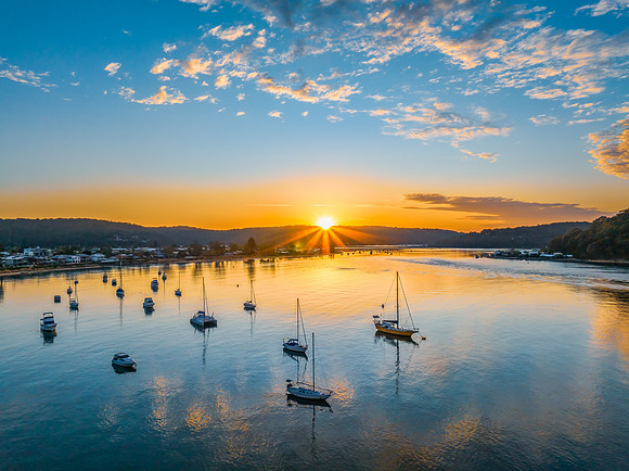 Sunrise views over the channel and bay with boats