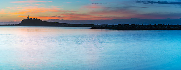 Breakwalls, Lighthouse and Sunrise Seascape Panorama