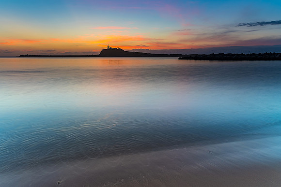 Silky Smooth Sunrise Seascape and Lighthouse