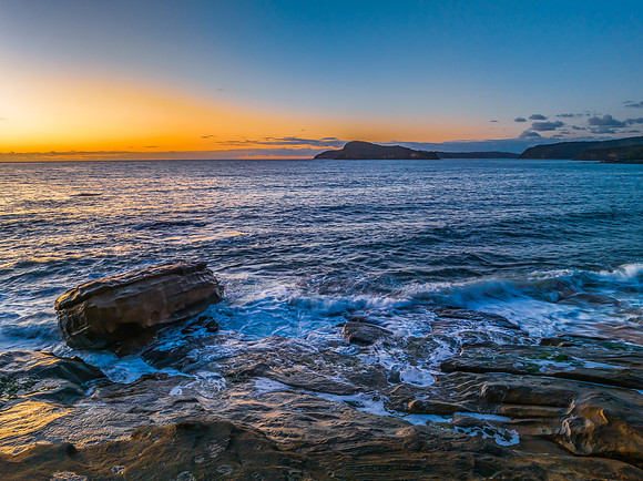 Aerial sunrise views over the ocean and beach