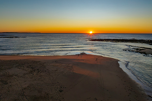 Aerial sunrise seascape with  clear skies