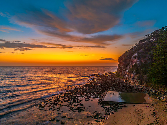 Sunrise at the seashore with clouds