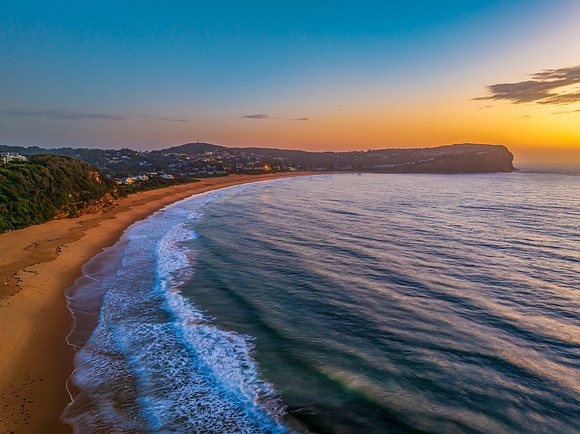 Sunrise at the seashore with clouds
