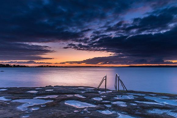 Purple and Orange Dawn Waterscape over the Lake