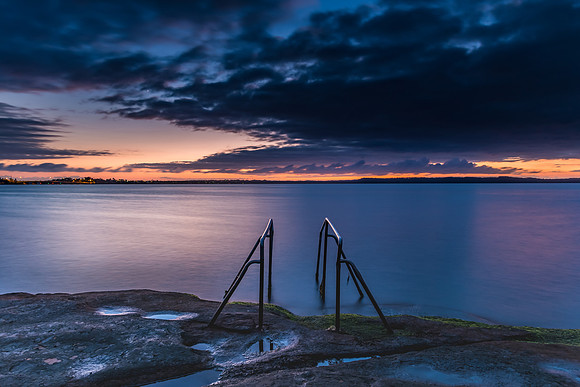 Purple and Orange Dawn Waterscape over the Lake