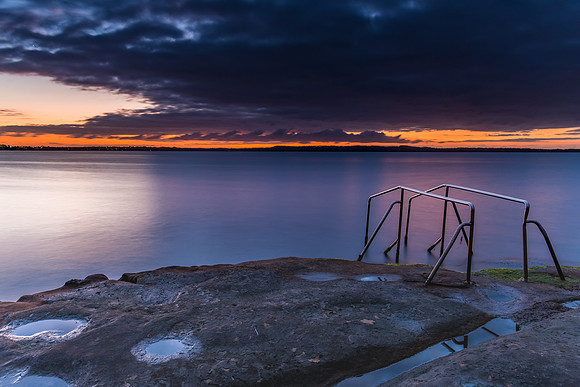 Purple and Orange Dawn Waterscape over the Lake