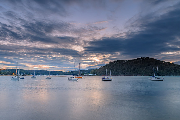 Cloudy Dawn on the Bay with Boats