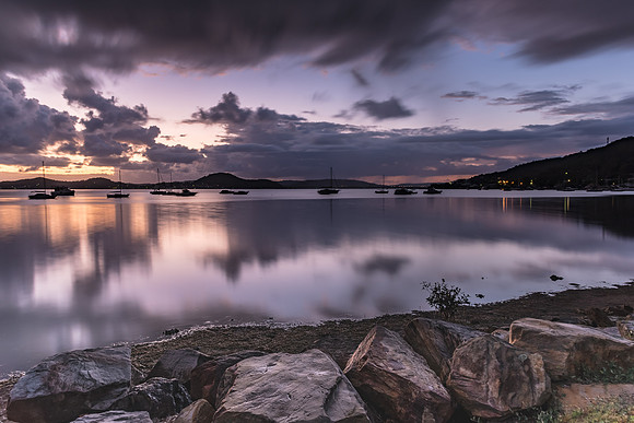 First Light with Heavy Rain Clouds on the Bay
