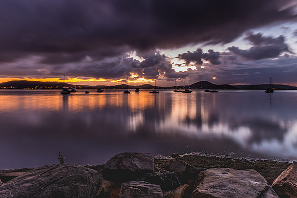 First Light with Heavy Rain Clouds on the Bay
