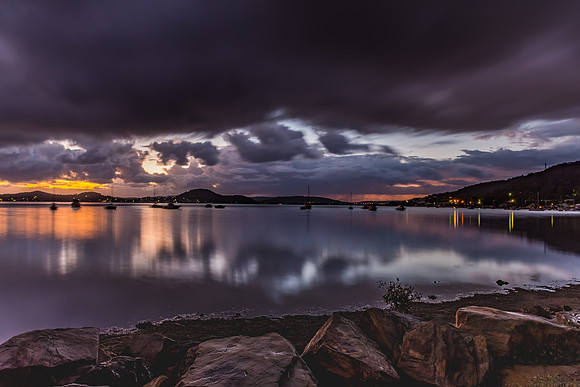First Light with Heavy Rain Clouds on the Bay