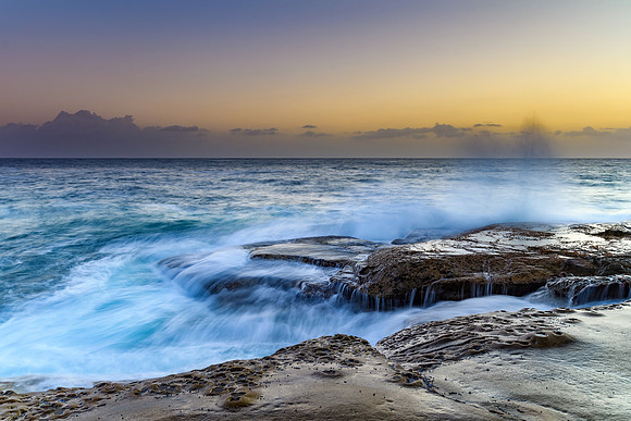 Hazy Sunrise Seascape from Rock Platform
