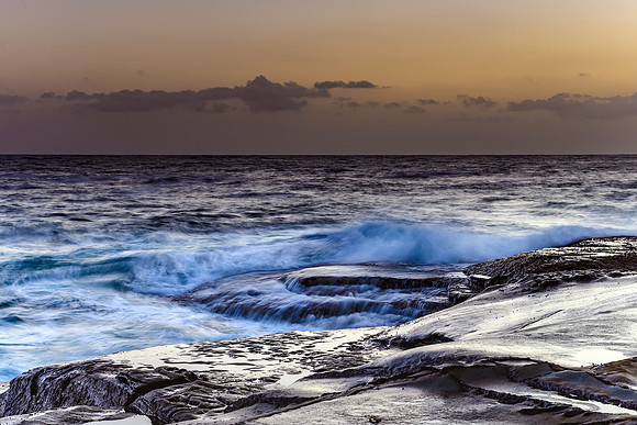 Hazy Sunrise Seascape from Rock Platform