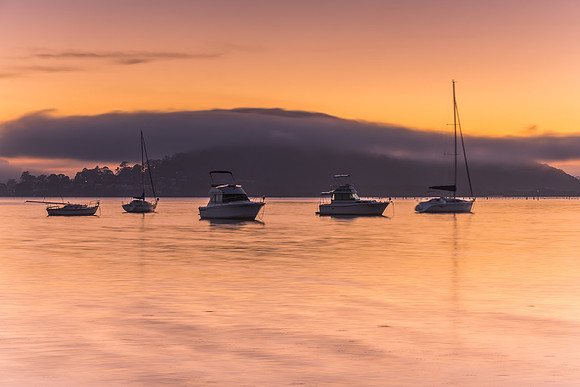 Shades of Dawn and Low Clouds on the Bay