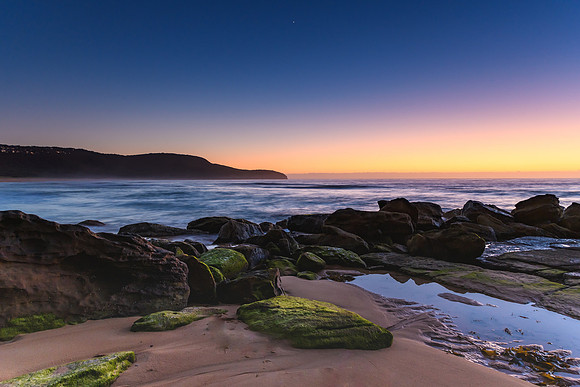 Rocky Dawn Reflections by the Sea