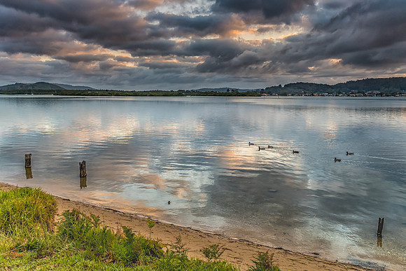 Early Morning Clouds and Reflections on the Bay
