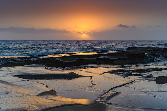 Hazy Sunrise Seascape from Rock Platform