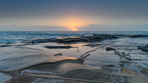 Hazy Sunrise Seascape from Rock Platform