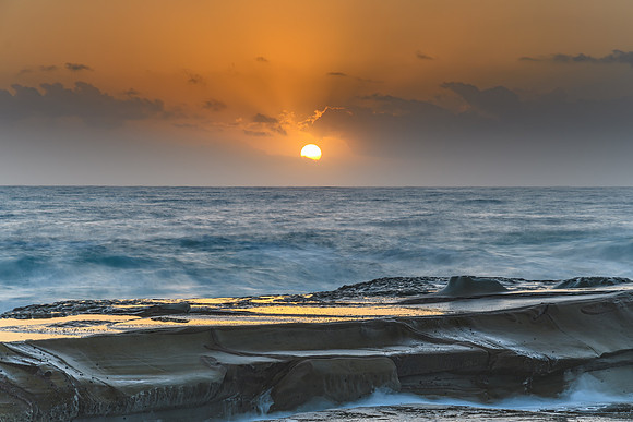 Hazy Sunrise Seascape from Rock Platform