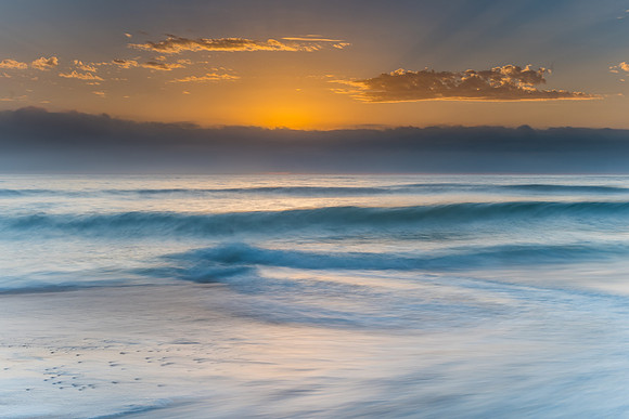Sunrise Glow from the Beach