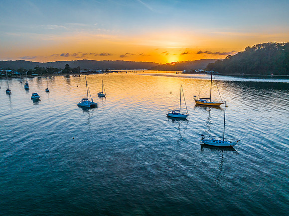 Early morning sunrise views at the waterfront where the water me