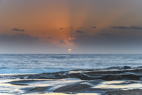 Hazy Sunrise Seascape from Rock Platform