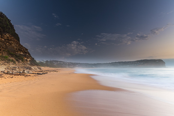 Sunrise Seascape the Beach and Low Cloud Bank