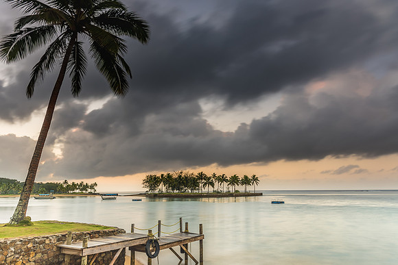 Tropical Sunrise with Island and Palm Trees