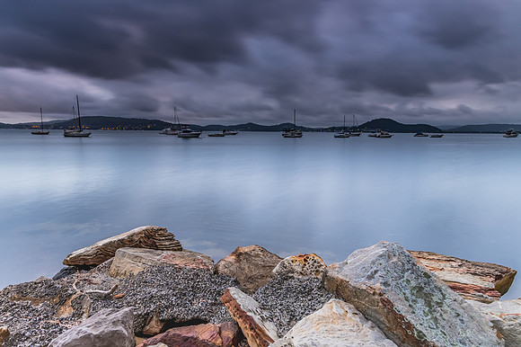 Overcast and Cloudy Bay with Boats