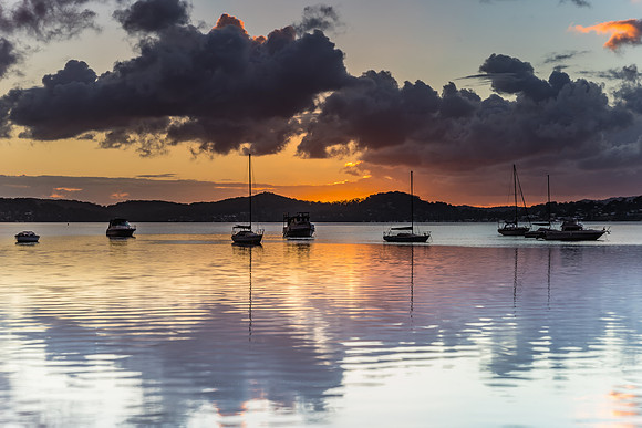 Sunrise and Cloudy Morning on the Bay with Boats