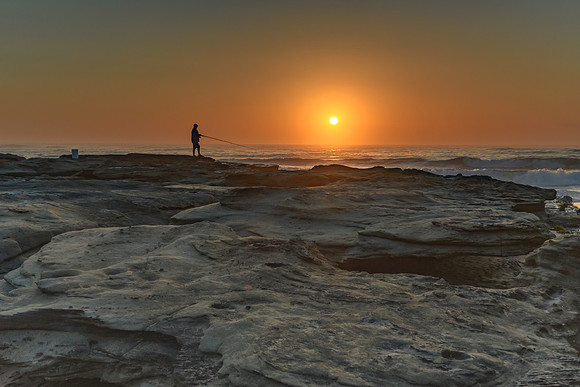 Sunrise , the Sea and the Fisherman