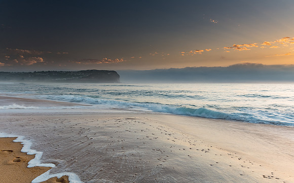 Sunrise Seascape the Beach and Low Cloud Bank