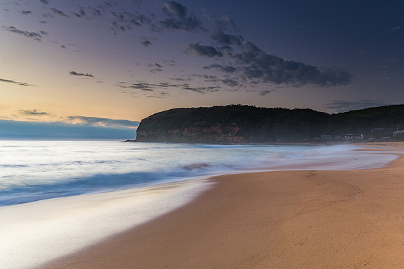 Sunrise Seascape the Beach and Low Cloud Bank
