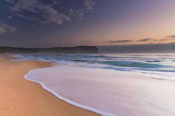 Sunrise Seascape the Beach and Low Cloud Bank