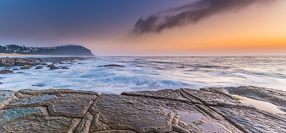 Sunrise Seascape Panorama and Tesselated Rock Ledge