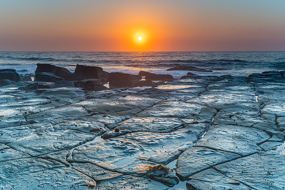 Sunrise Seascape and Tesselated Rock Ledge