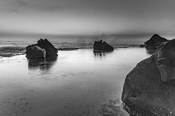 Sunrise Seascape and Rock Ledge in Black and White