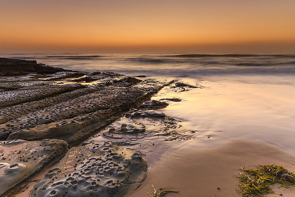 Beach Seascape and Rock Ledge in Soft Shades of Brown