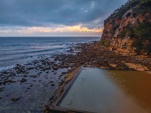 Cloud filled sunrise at the seaside