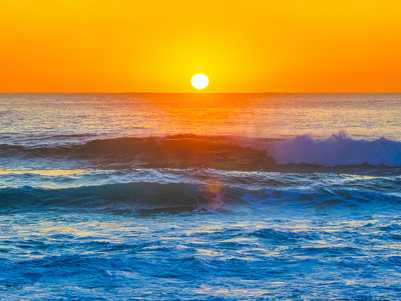 Sunrise at the Seaside with an Orange Horizon