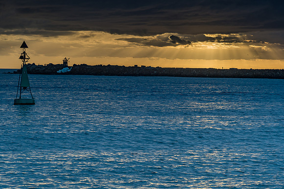 Crepuscular Rays over Newcastle Break Wall