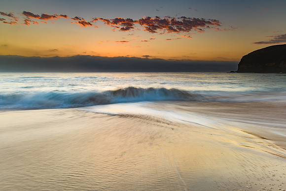 Sunrise Seascape the Beach and Low Cloud Bank