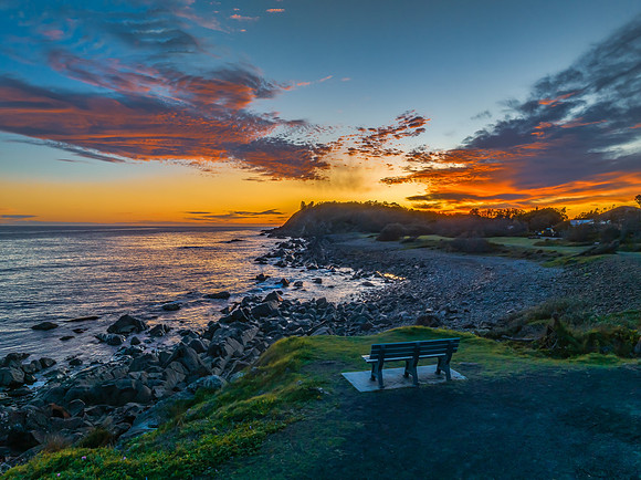 Coastal Sunrise with Rock Formations
