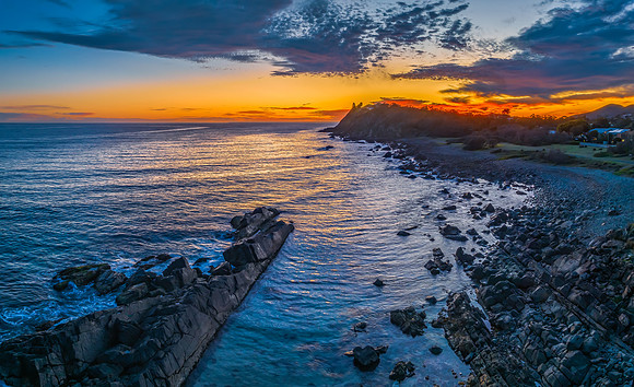 Coastal Sunrise with Rock Formations