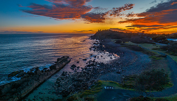 Coastal Sunrise with Rock Formations