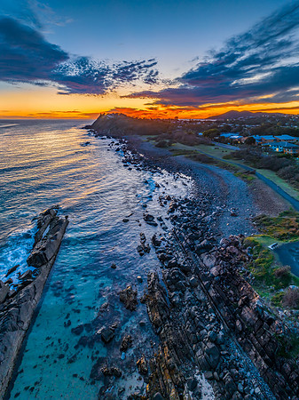 Coastal Sunrise with Rock Formations